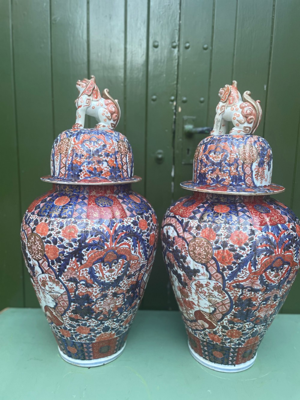 Fine large pair of mid C19th Japanese Imari porcelain vases and covers . View II