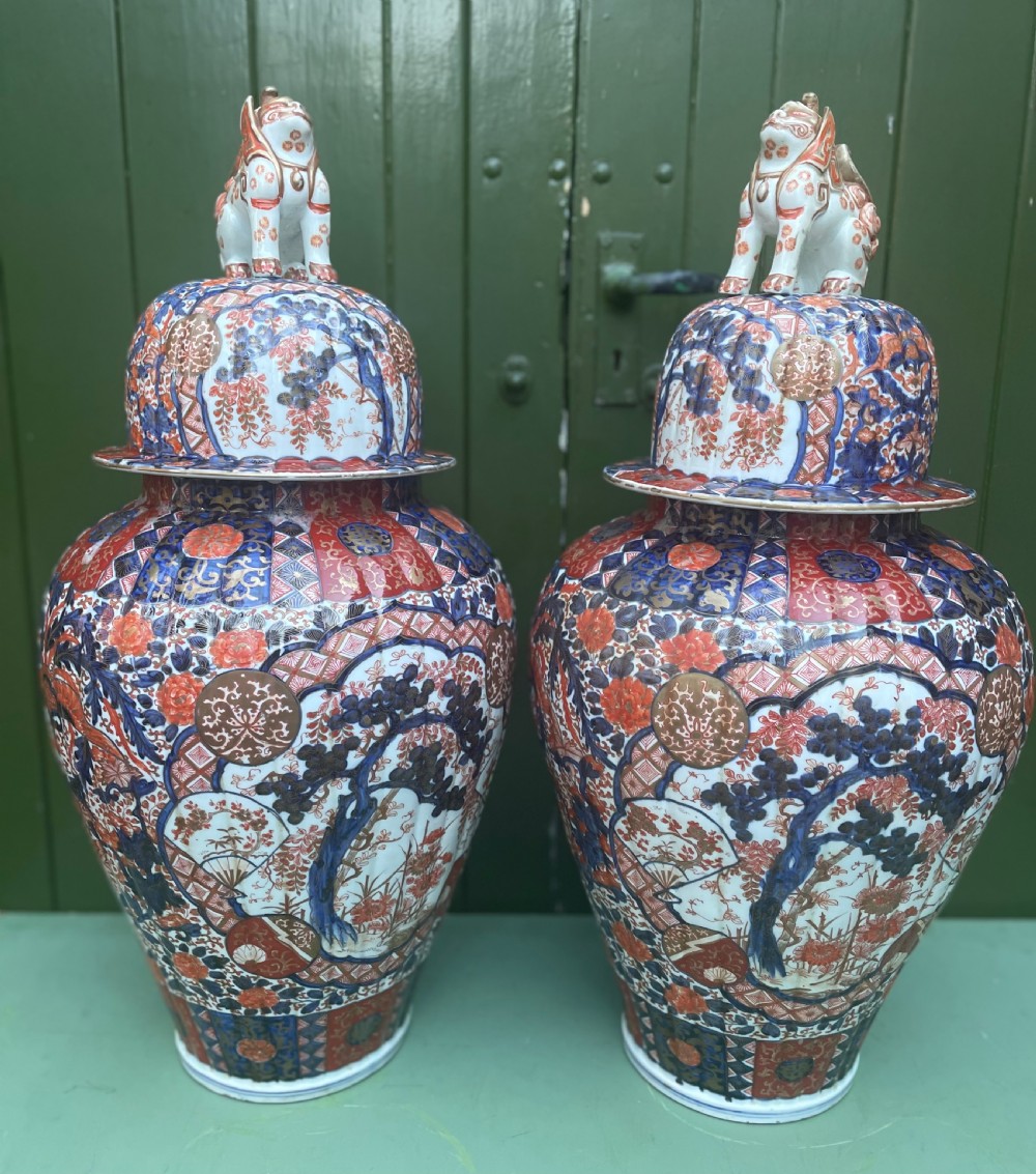 Fine large pair of mid C19th Japanese Imari porcelain vases and covers . View III