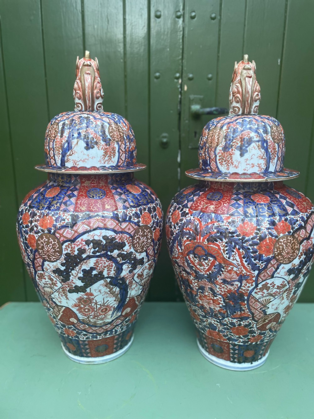 Fine large pair of mid C19th Japanese Imari porcelain vases and covers . View IV