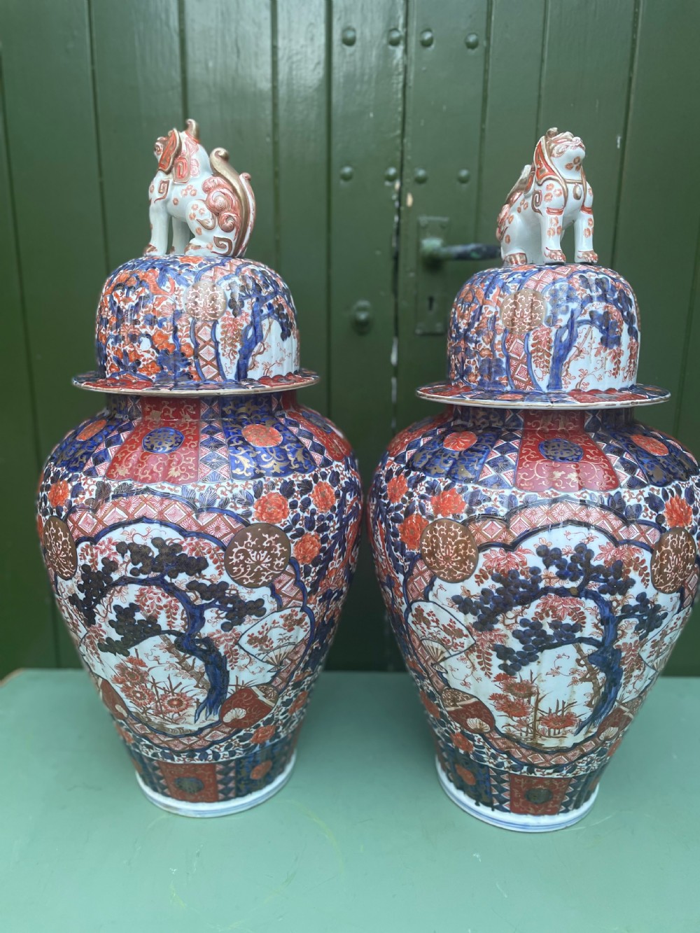 Fine large pair of mid C19th Japanese Imari porcelain vases and covers . View IX