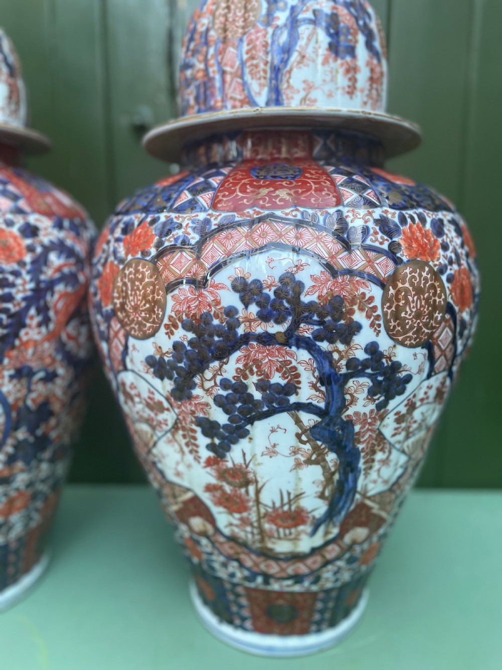 Fine large pair of mid C19th Japanese Imari porcelain vases and covers . View X