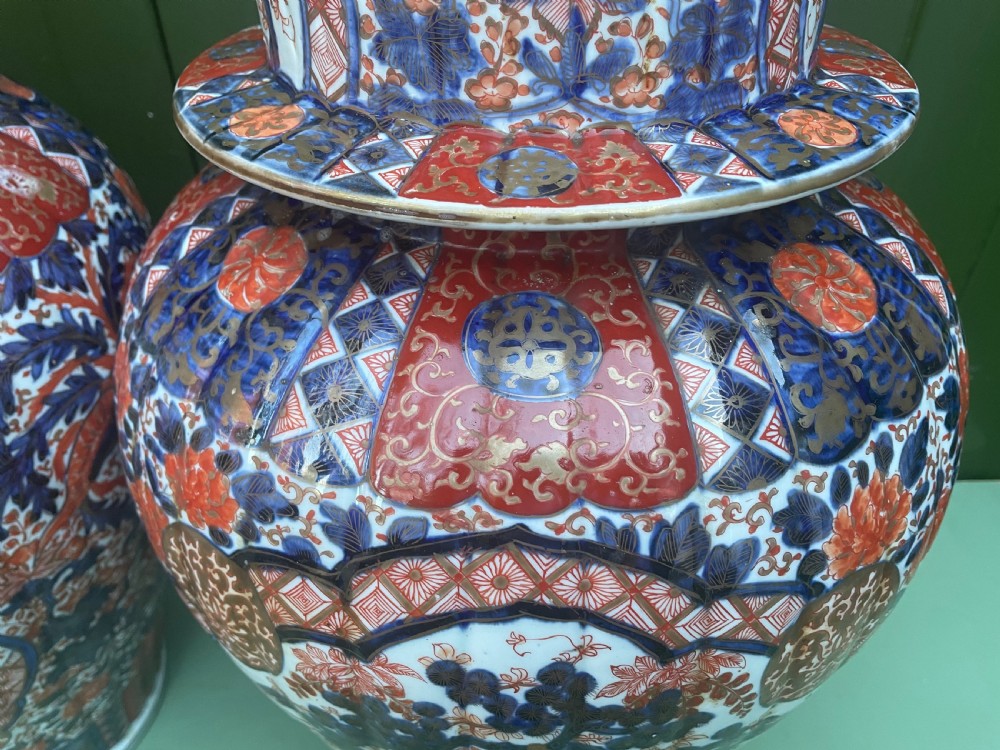 Fine large pair of mid C19th Japanese Imari porcelain vases and covers . View XVIII