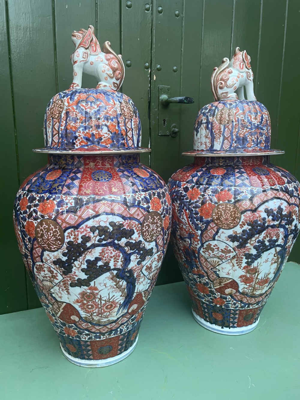 Fine large pair of mid C19th Japanese Imari porcelain vases and covers . View XIX
