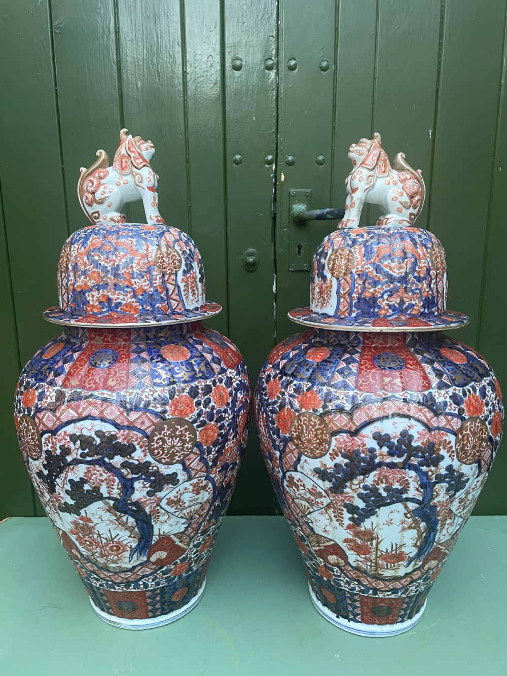 Fine large pair of mid C19th Japanese Imari porcelain vases and covers . View XX