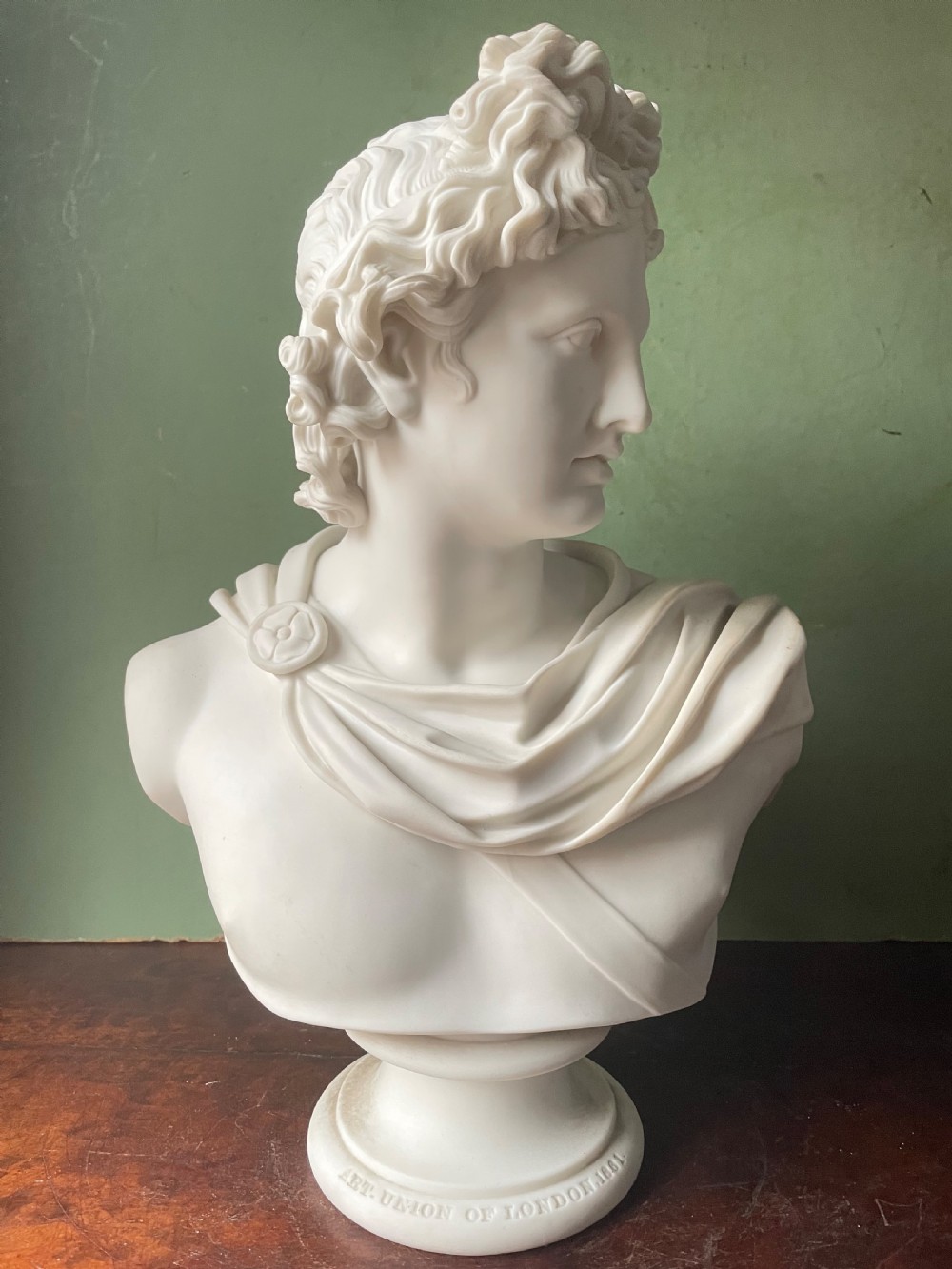 C19th parian ware porcelain bust study of the “Apollo Belvedere”. 