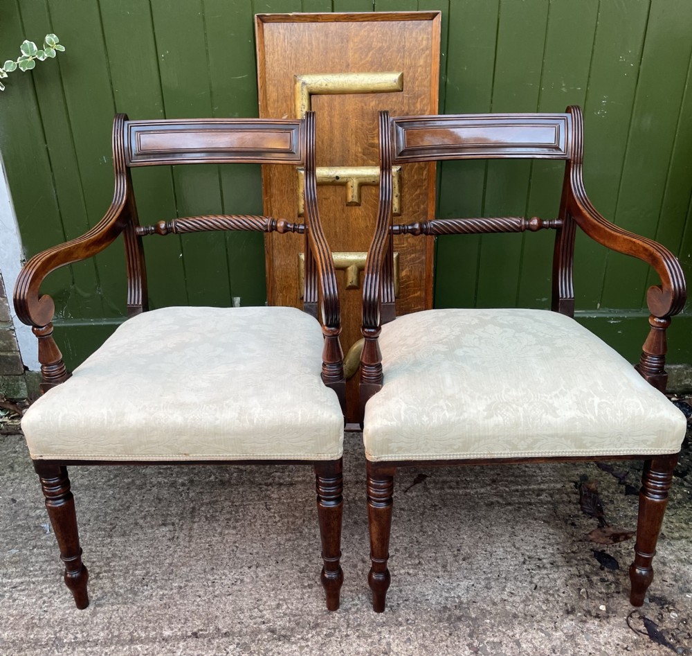 Pair of early C19th Regency period mahogany armchairs.