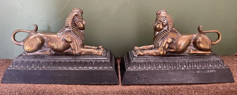 Pair of decorative mid C19th brass and cast-iron Sphinx andirons.