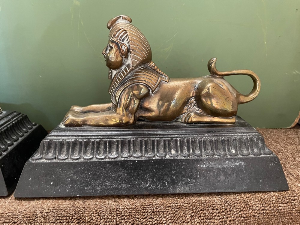 Pair of decorative mid C19th brass and cast-iron Sphinx andirons. View II