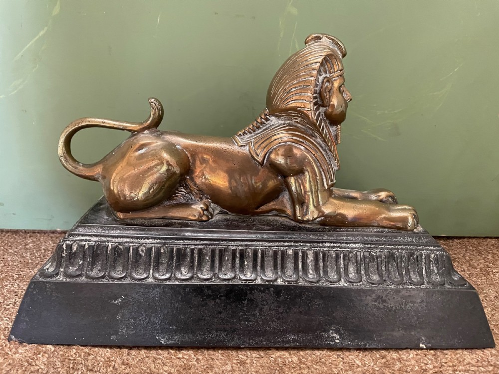 Pair of decorative mid C19th brass and cast-iron Sphinx andirons. View IX