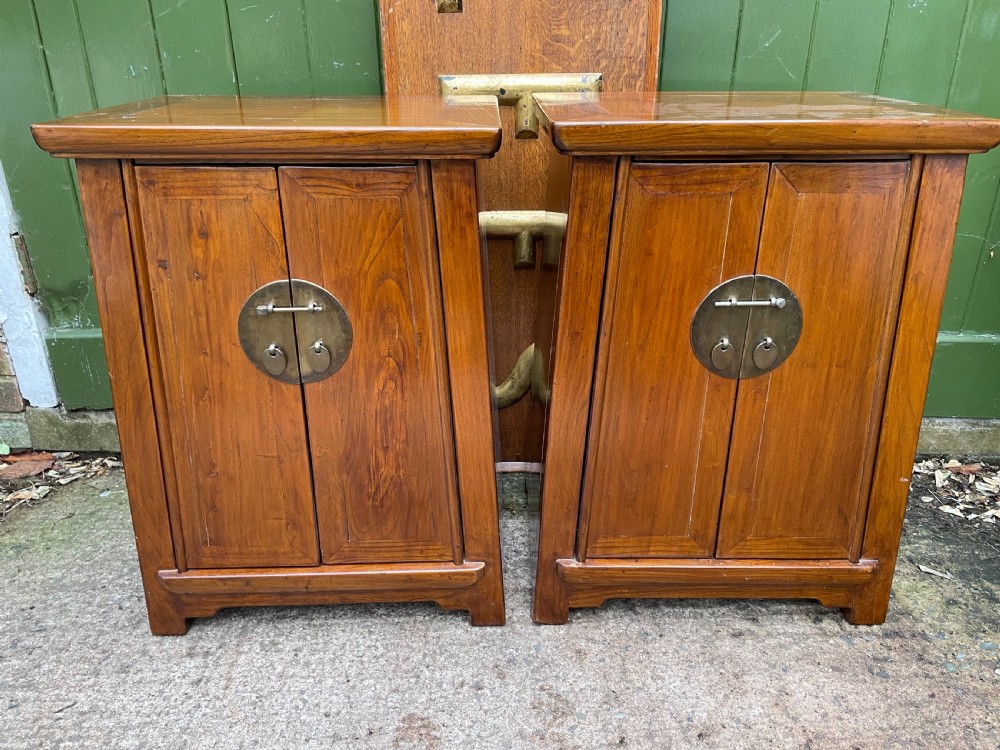 Pair of early C20th Chinese Republic period hardwood bedside cupboards.
