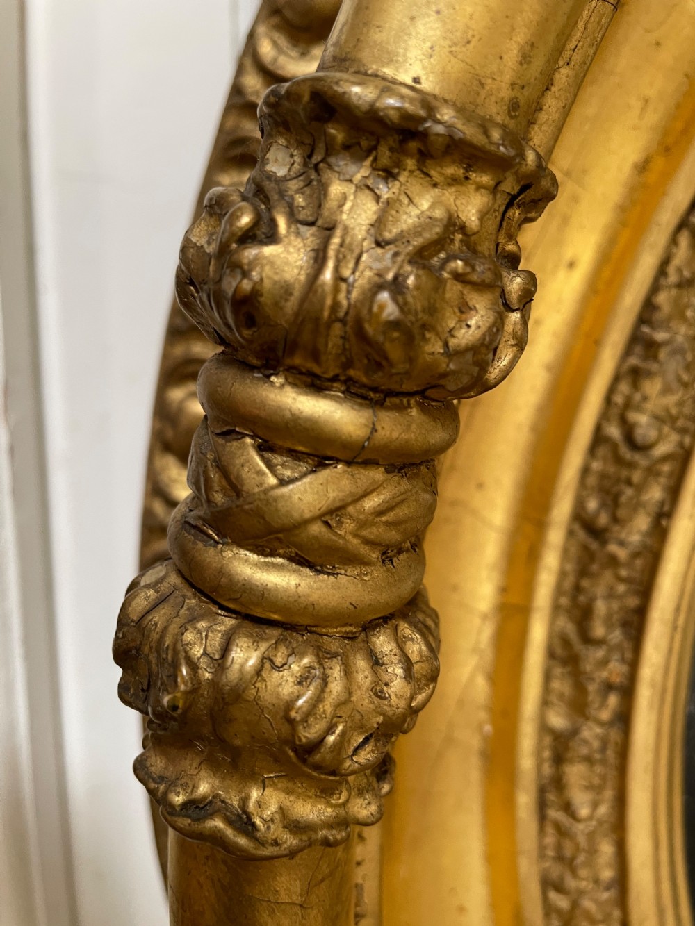 Large early C19th Regency period carved gilt-wood frame convex plate mirror  View VIII