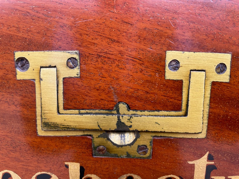 A late eighteenth-century George III mahogany estate cabinet featuring upper panel doors above drawers with gilded alphabetical lettering. View XXII
