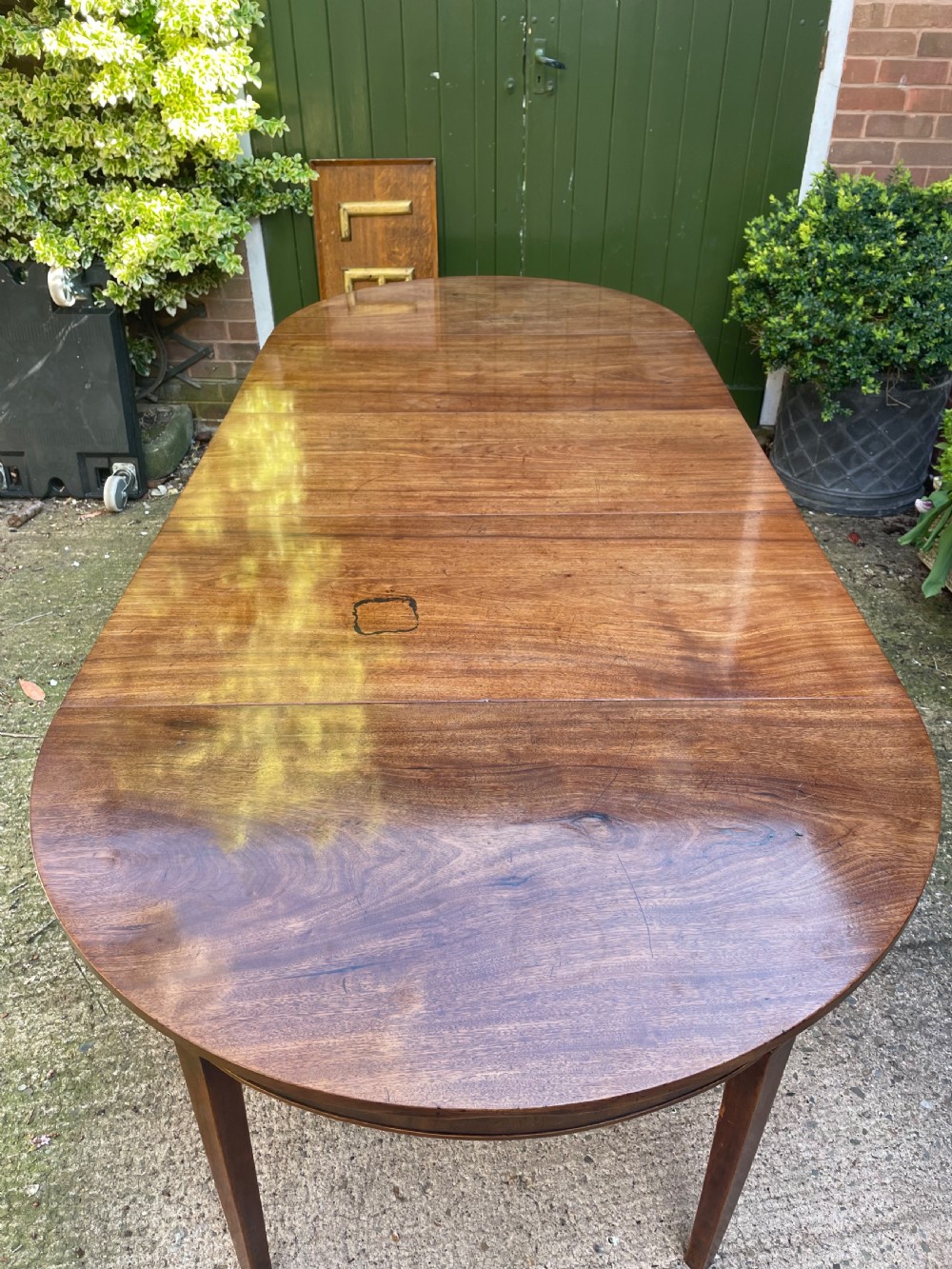 Late C18th George III period mahogany d-end dining table of highly versatile format. View VIII