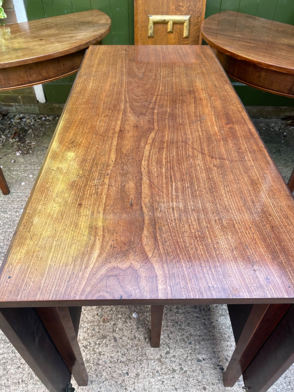 Late C18th George III period mahogany d-end dining table of highly versatile format. View XIV