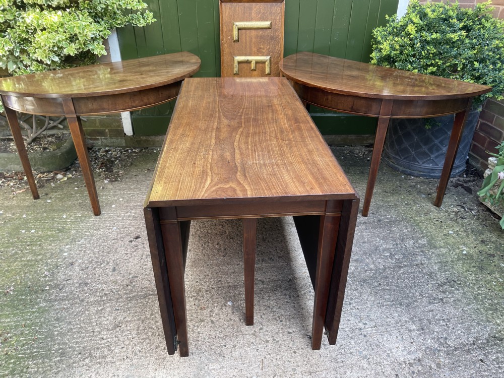 Late C18th George III period mahogany d-end dining table of highly versatile format. View XIX