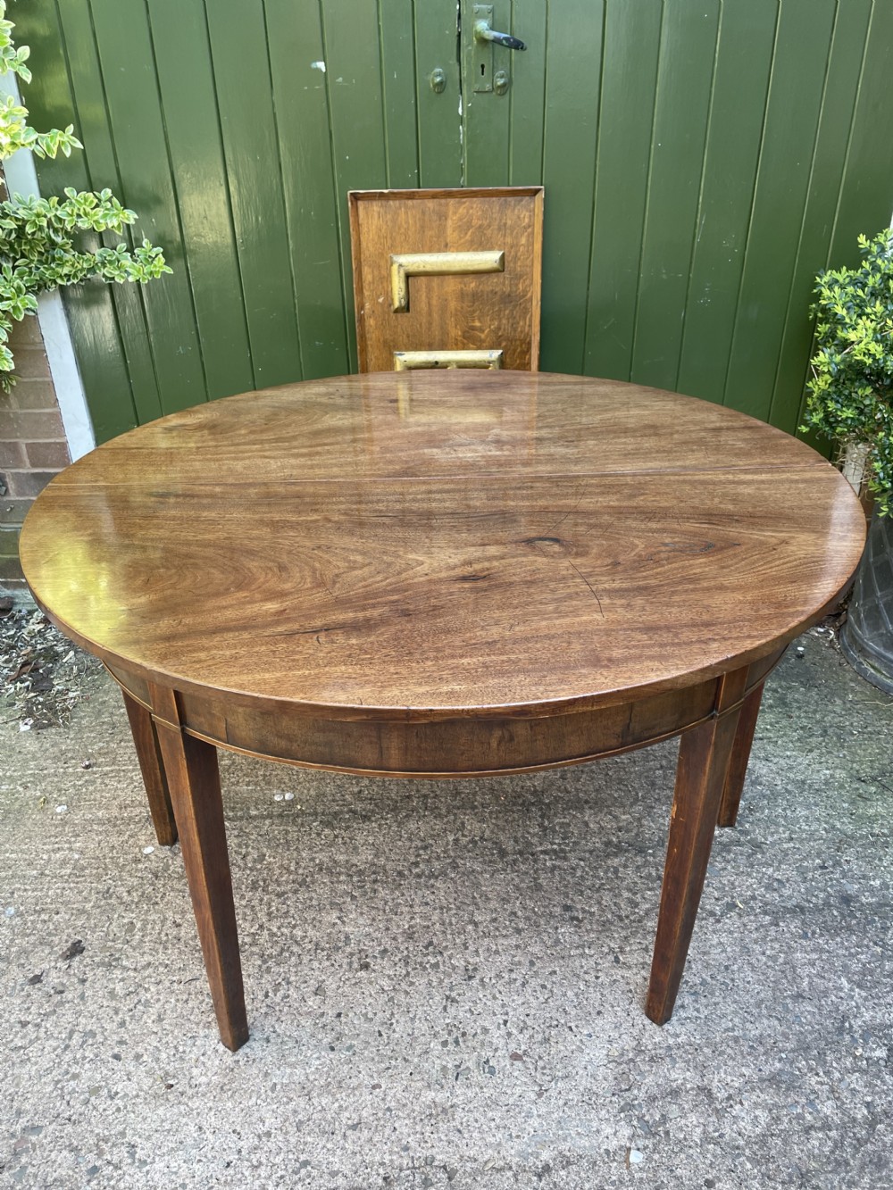 Late C18th George III period mahogany d-end dining table of highly versatile format. View XX