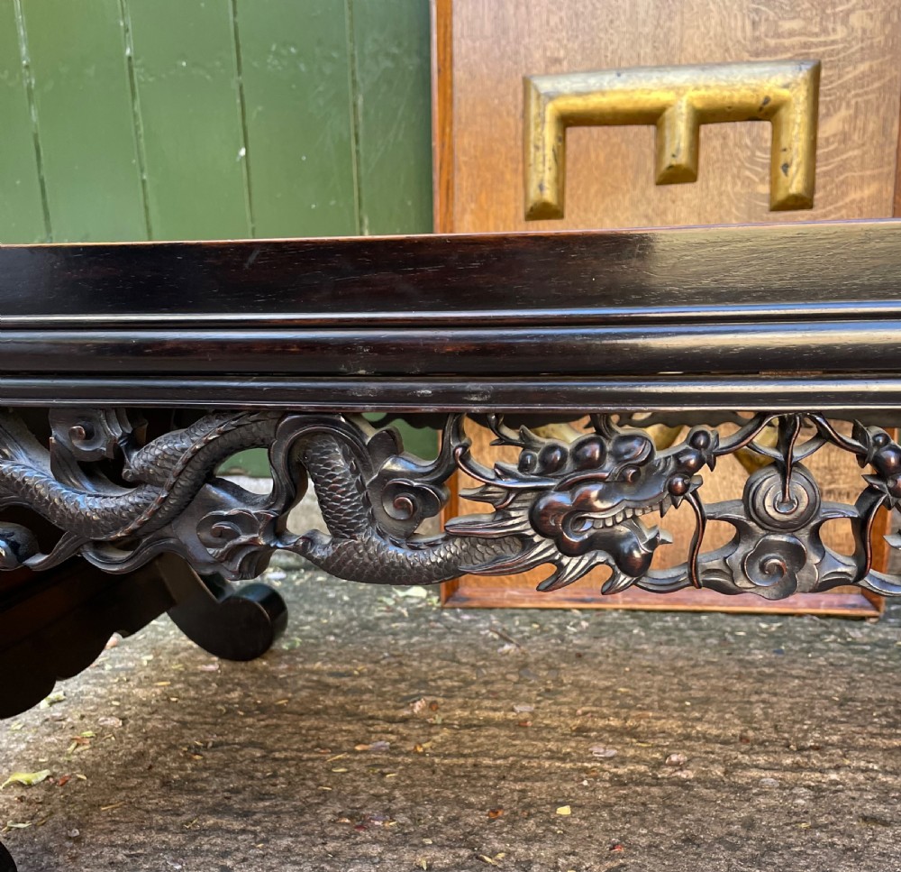 Late C19th/ early C20th Chinese Qing Dynasty carved hardwood ‘opium’ or Kang table. View II