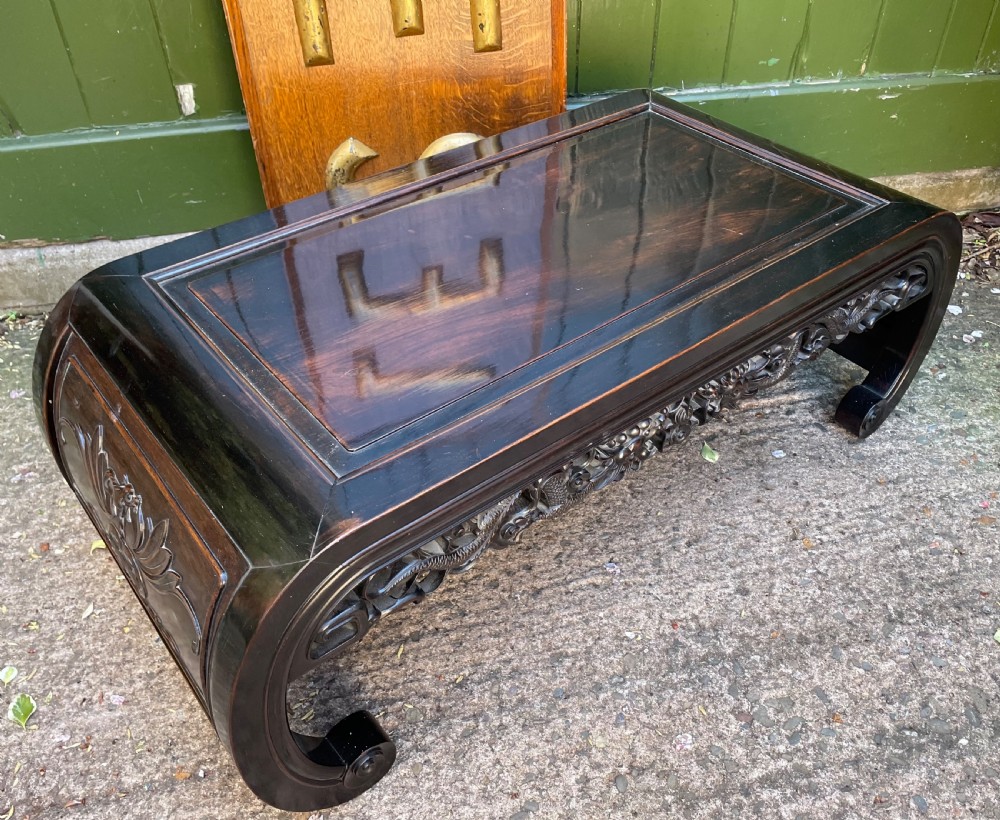Late C19th/ early C20th Chinese Qing Dynasty carved hardwood ‘opium’ or Kang table. View IV