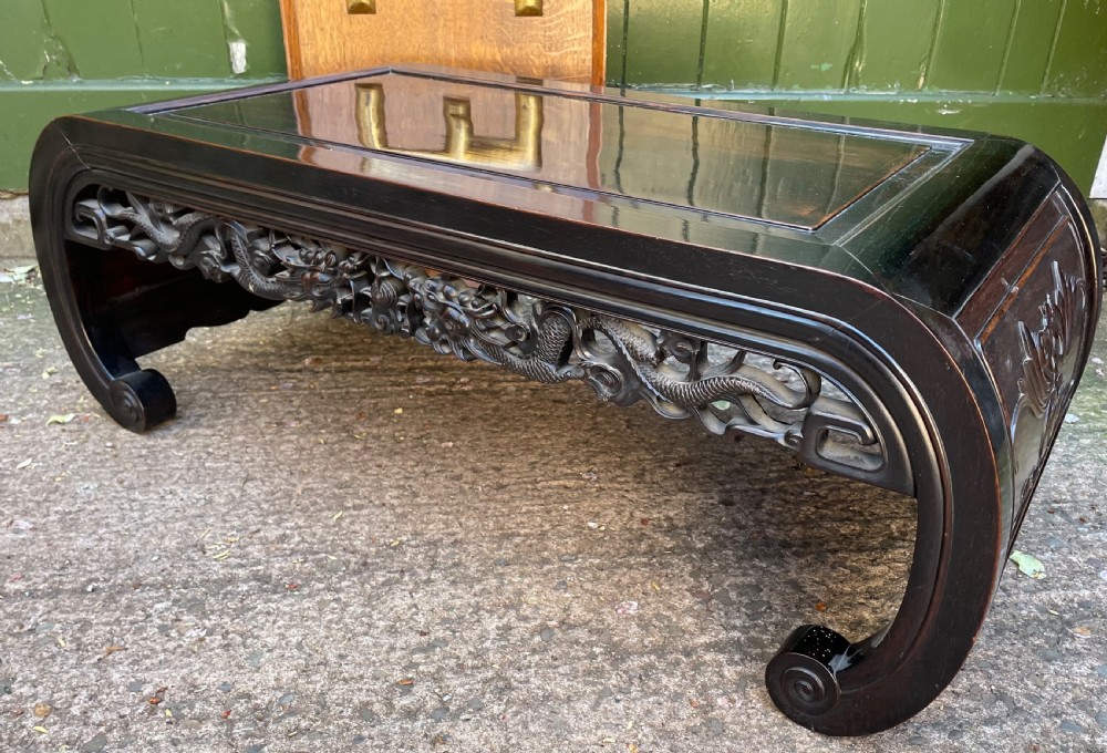 Late C19th/ early C20th Chinese Qing Dynasty carved hardwood ‘opium’ or Kang table. View VII
