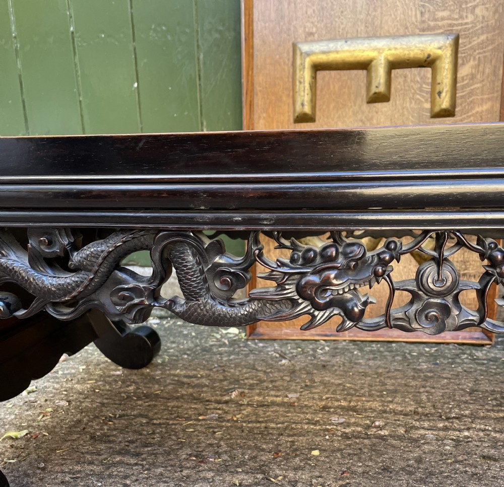 Late C19th/ early C20th Chinese Qing Dynasty carved hardwood ‘opium’ or Kang table. View X