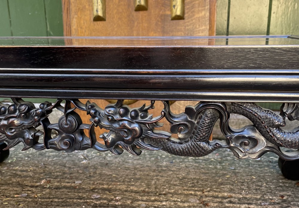 Late C19th/ early C20th Chinese Qing Dynasty carved hardwood ‘opium’ or Kang table. View XI