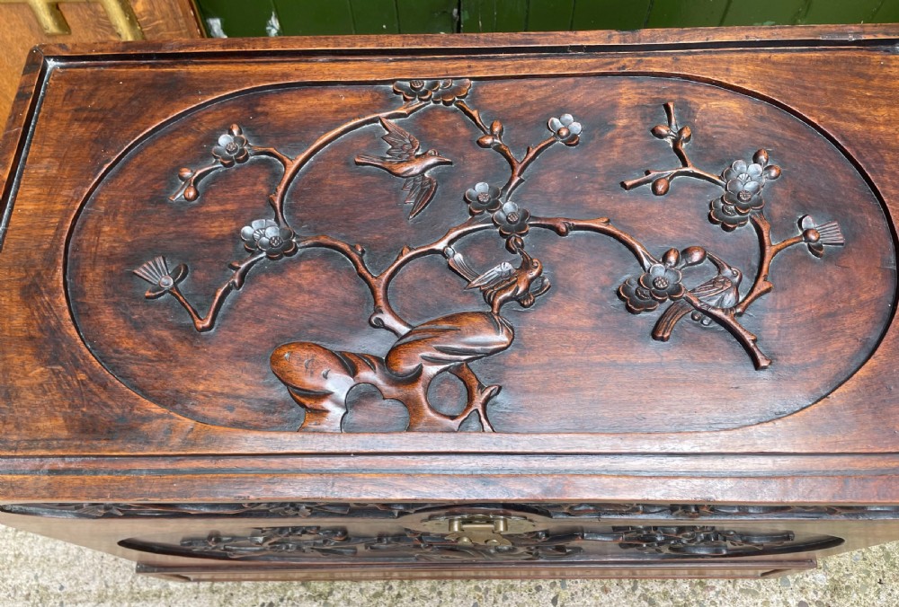 Late C19th Chinese Qing Dynasty carved hardwood trunk on stand. View IV