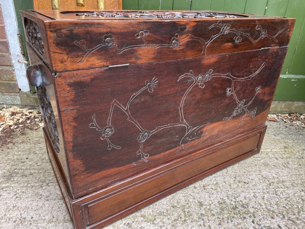 Late C19th Chinese Qing Dynasty carved hardwood trunk on stand. View X