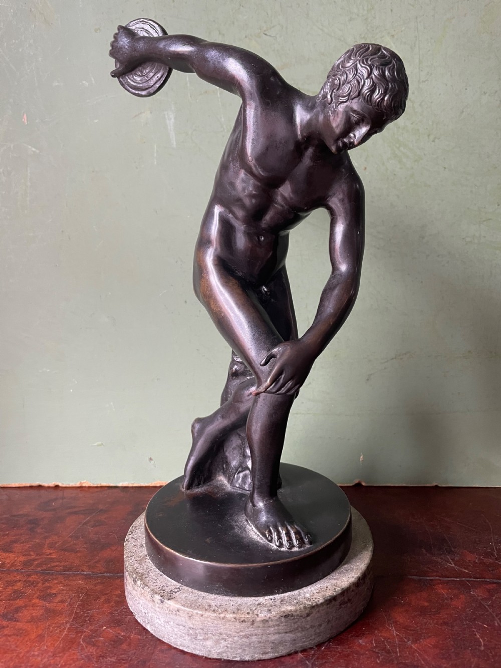 Late C19th Italian ‘Grand Tour’ souvenir bronze reduction after the antique, of the “Discobolus” .
