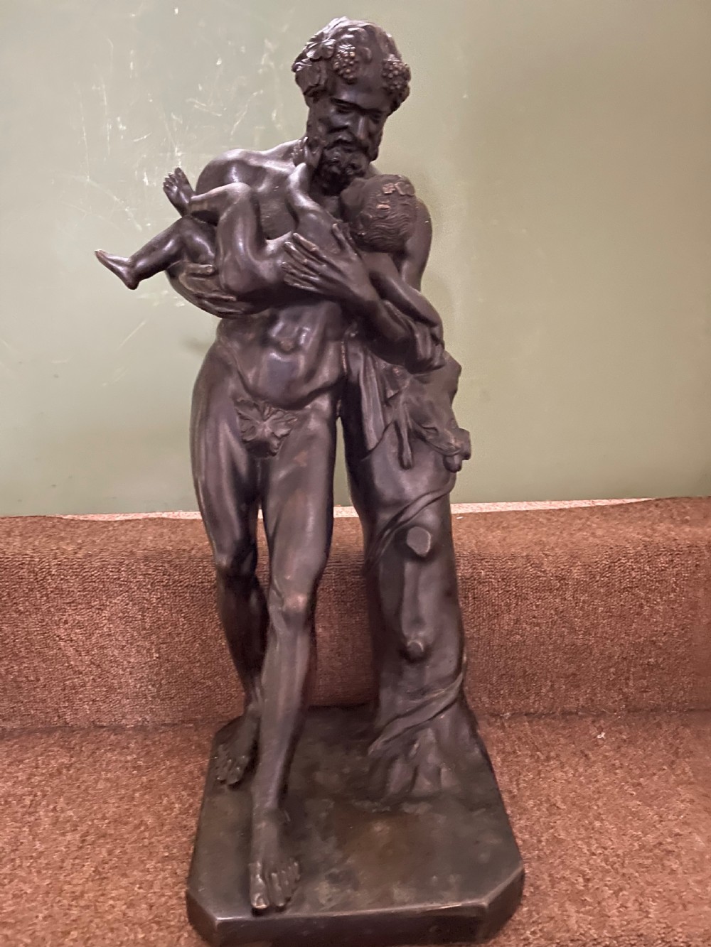 Large mid C19th Italian ‘Grand Tour’ souvenir bronze sculpture, after the antique, of Silenus cradling the Infant Bacchus.