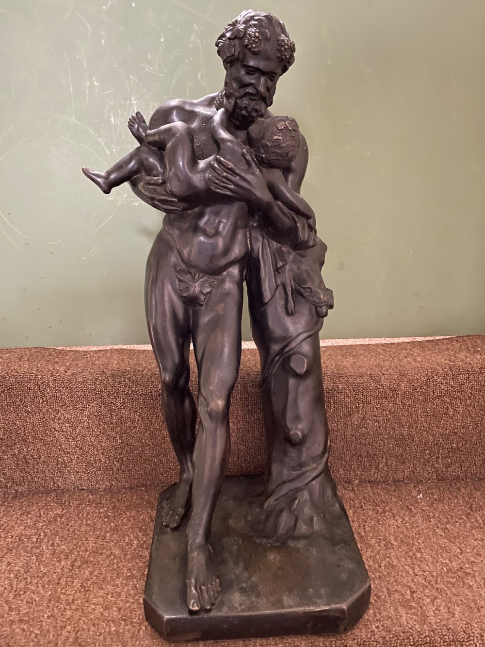 Large mid C19th Italian ‘Grand Tour’ souvenir bronze sculpture, after the antique, of Silenus cradling the Infant Bacchus. View II