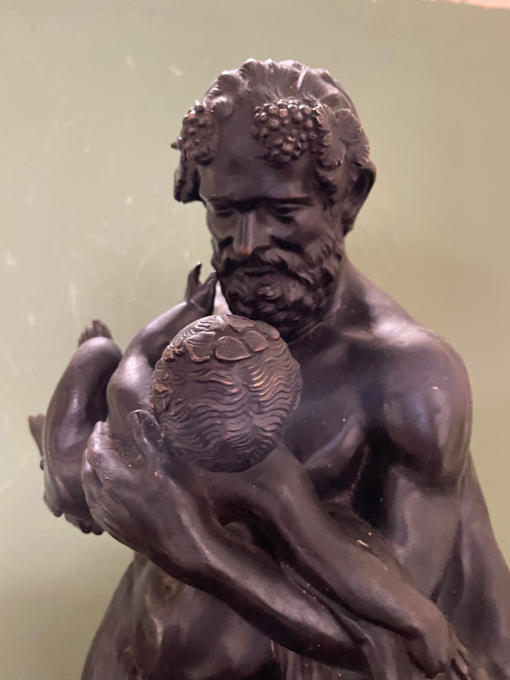 Large mid C19th Italian ‘Grand Tour’ souvenir bronze sculpture, after the antique, of Silenus cradling the Infant Bacchus. View IV