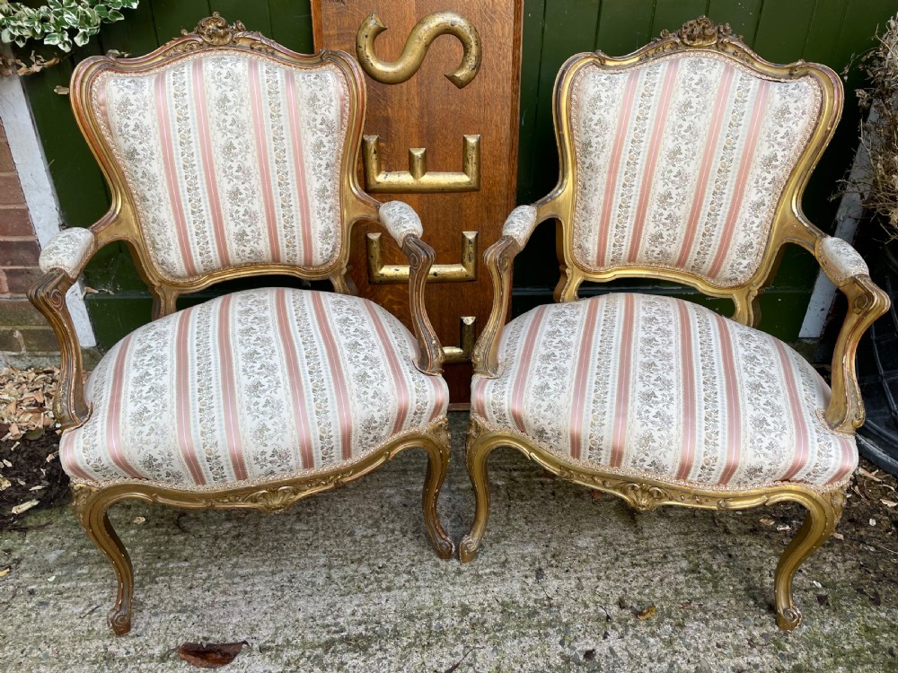 Elegant pair of late C19th French carved gilt-wood salon armchairs in the C18th Louis XVI period rococo style. View II