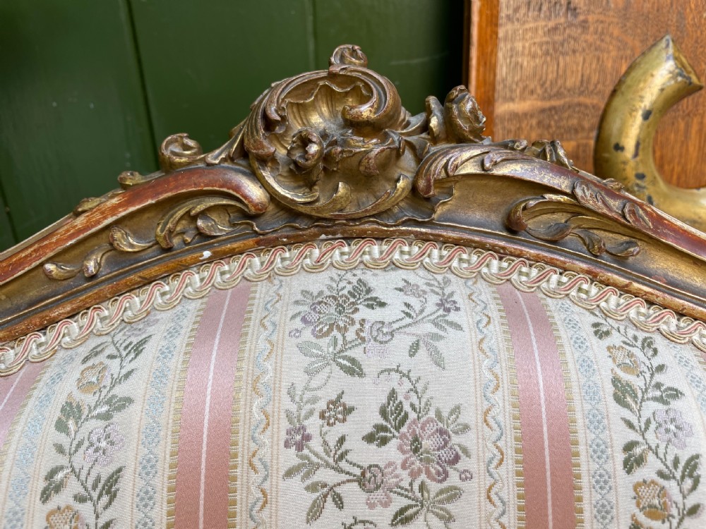 Elegant pair of late C19th French carved gilt-wood salon armchairs in the C18th Louis XVI period rococo style. View V