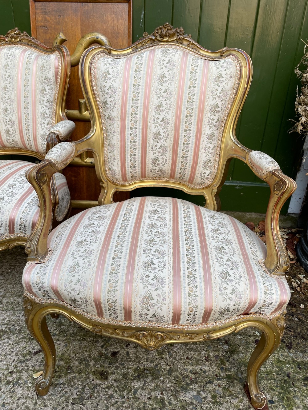 Elegant pair of late C19th French carved gilt-wood salon armchairs in the C18th Louis XVI period rococo style. View XVII