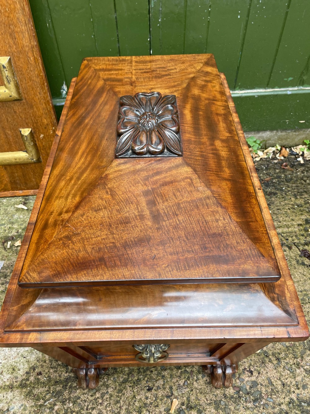 Early C19th Regency period brass-mounted mahogany cellarette or wine-cooler of classical sarcophagus form with a noble armorial . View XVIII