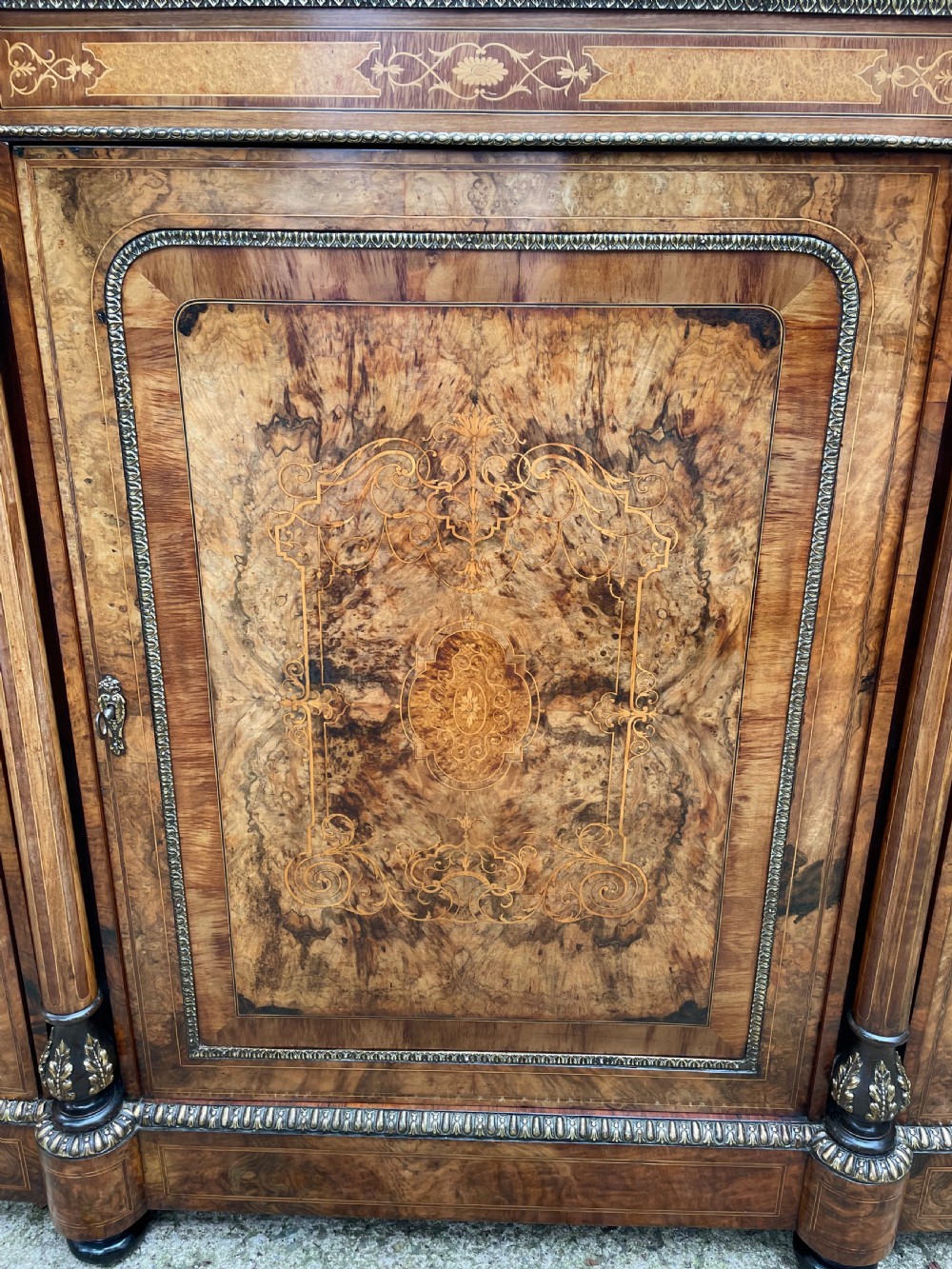 Fine quality mid C19th ormolu-mounted burr walnut bow-ended credenza. View VII