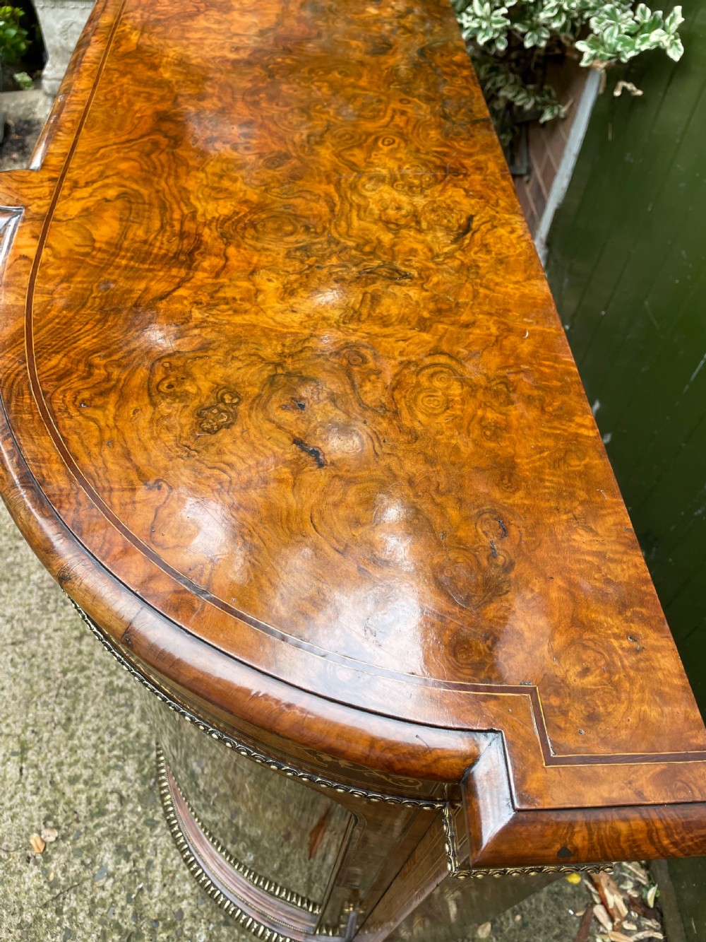Fine quality mid C19th ormolu-mounted burr walnut bow-ended credenza. View IX