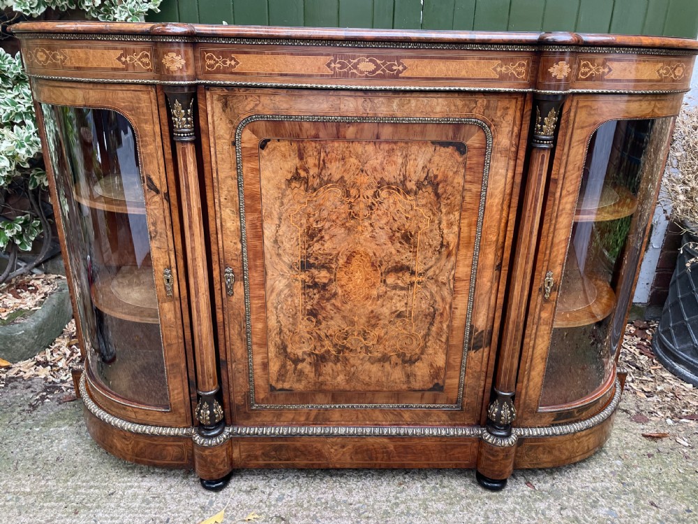 Fine quality mid C19th ormolu-mounted burr walnut bow-ended credenza. View XIX
