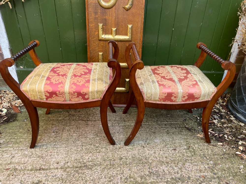 Set of four early nineteenth-century mahogany dressing stools with raised spiral-turned handles, swept legs, and red and gold patterned damask seats. View XI