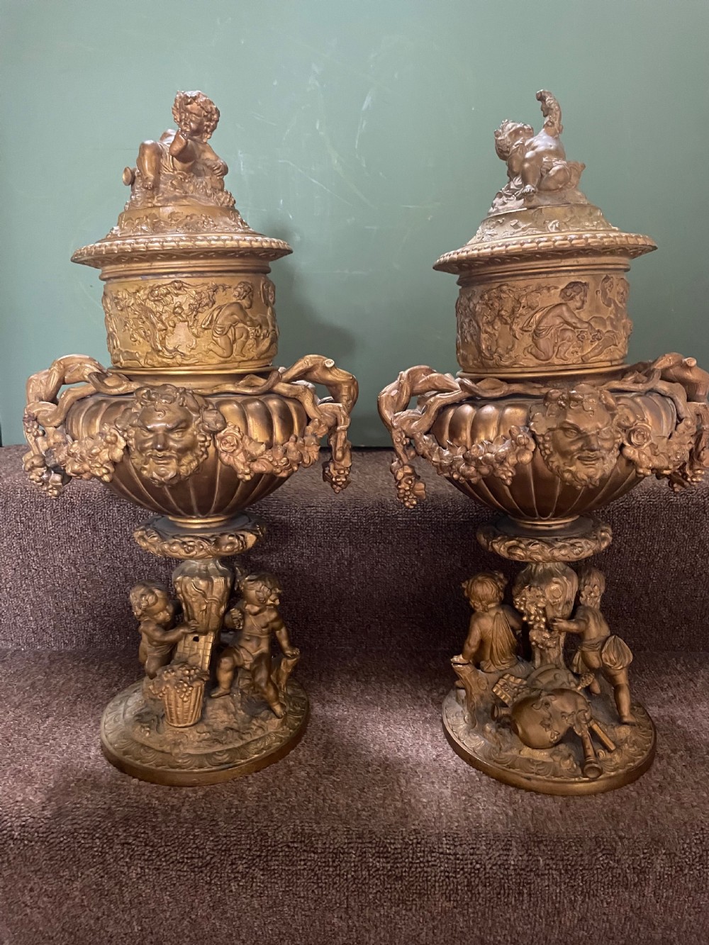 Pair of large late C19th French Napoleon III period gilt metal wine-coolers of circular form, after ‘Clodion’ .
