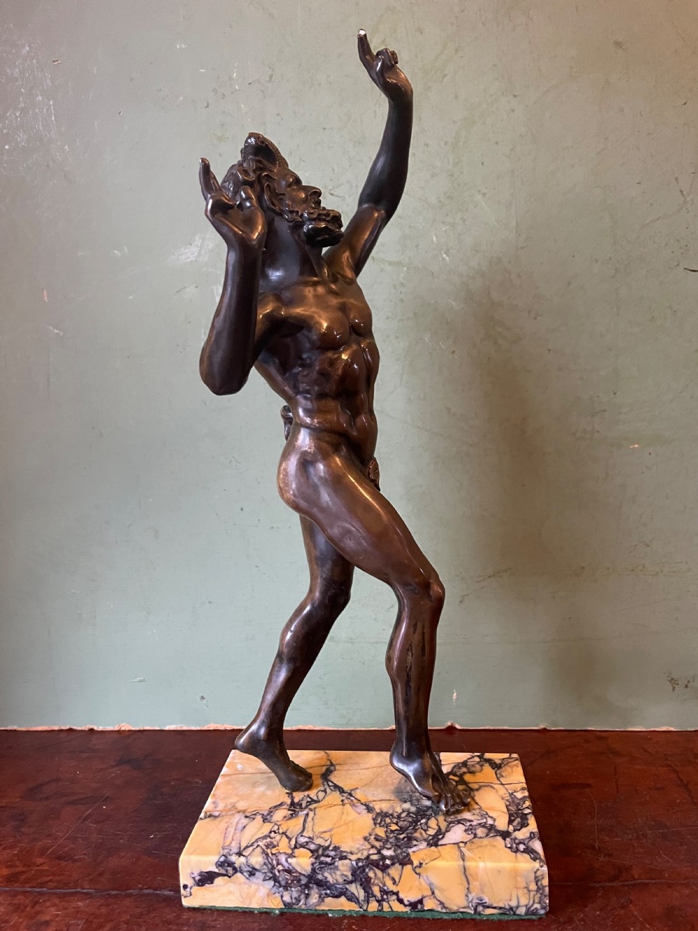 Early C19th Italian ‘Grand Tour’ souvenir bronze reduction, after the antique, of  “The Dancing Faun of Pompeii” . View III