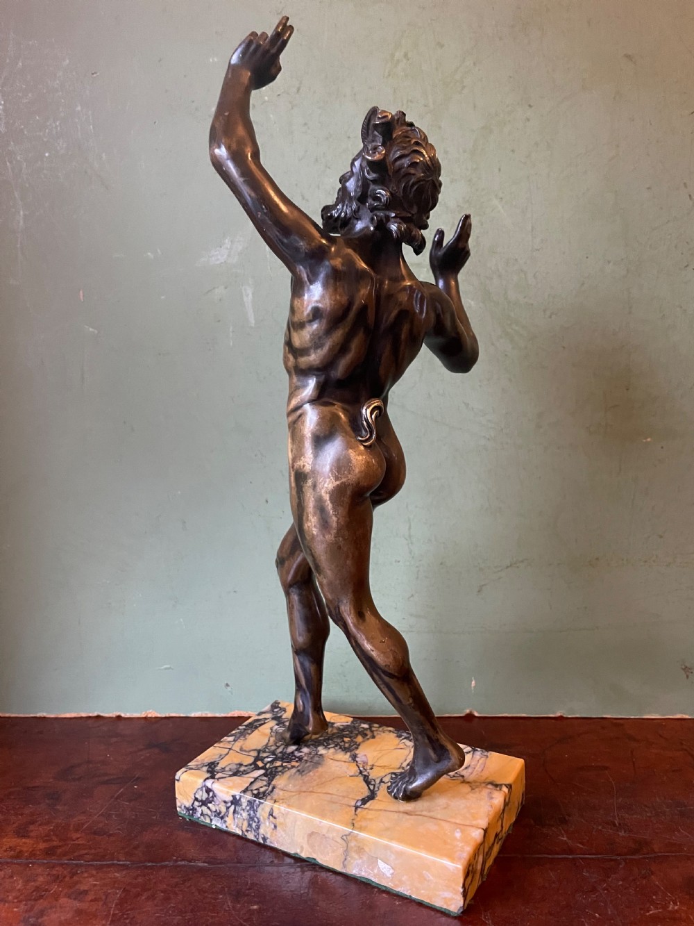 Early C19th Italian ‘Grand Tour’ souvenir bronze reduction, after the antique, of  “The Dancing Faun of Pompeii” . View VI