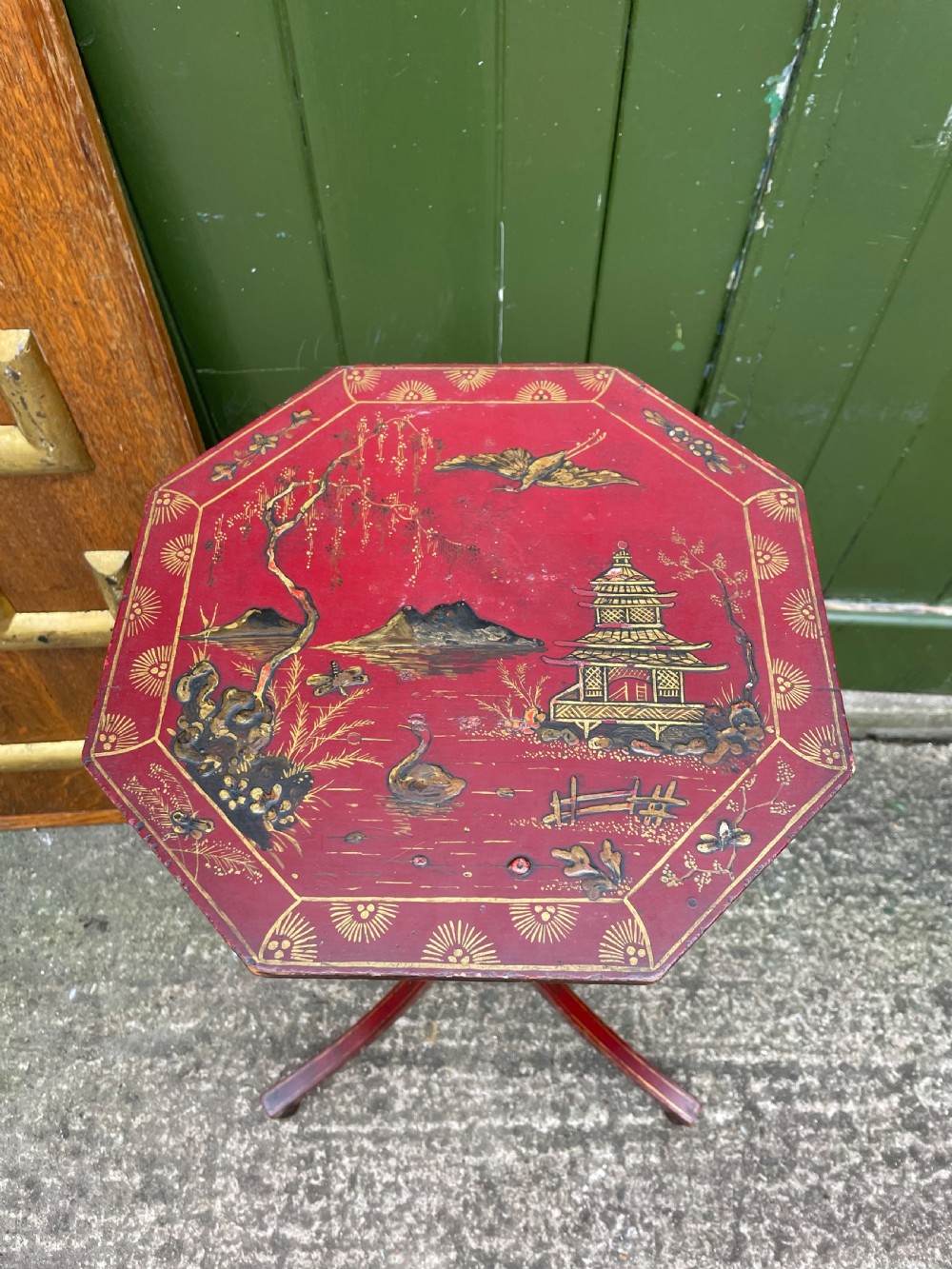 Late 19th / early C20th Chinoiserie decorated vermilion red lacquer tripod table or candlestand in the late C18th George III period style. View II