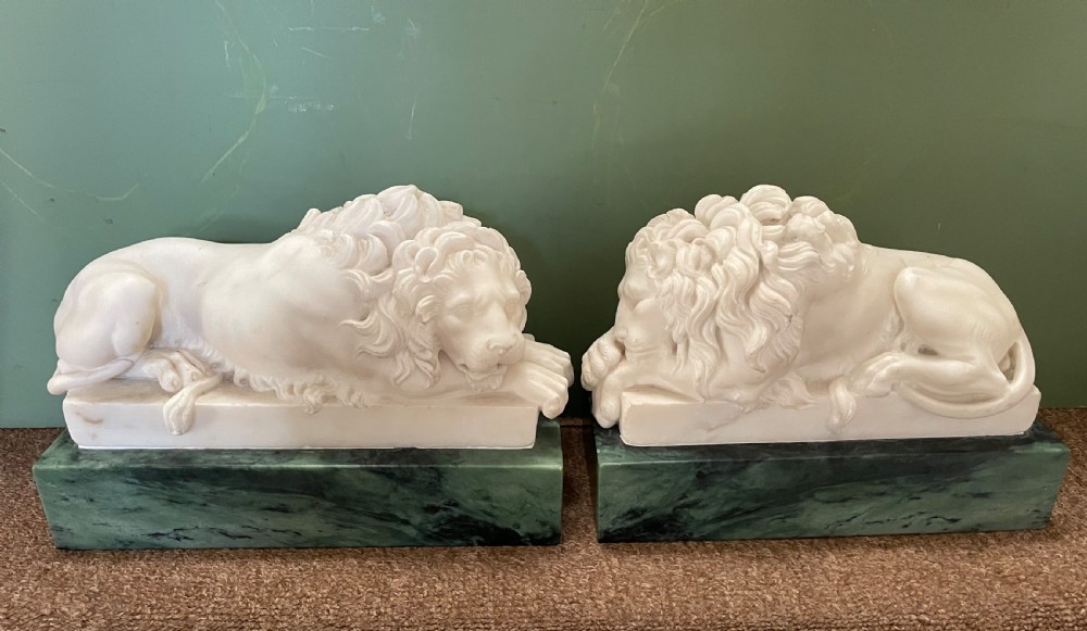 Magnificent pair of early C19th Italian ‘Grand Tour’ souvenir carved white statuary marble lions after Antonio Canova . View II