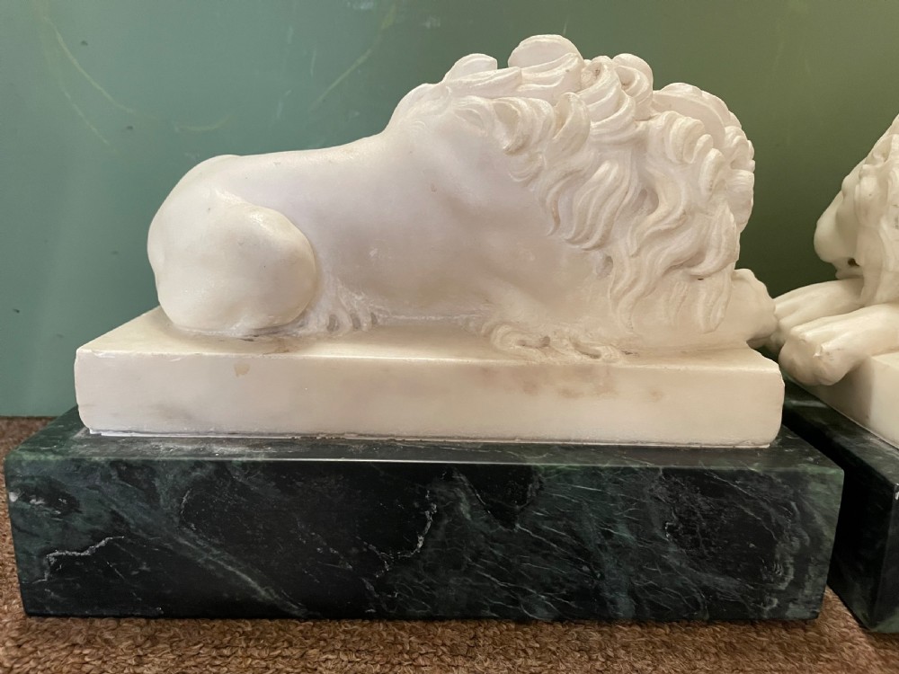 Magnificent pair of early C19th Italian ‘Grand Tour’ souvenir carved white statuary marble lions after Antonio Canova . View VIII