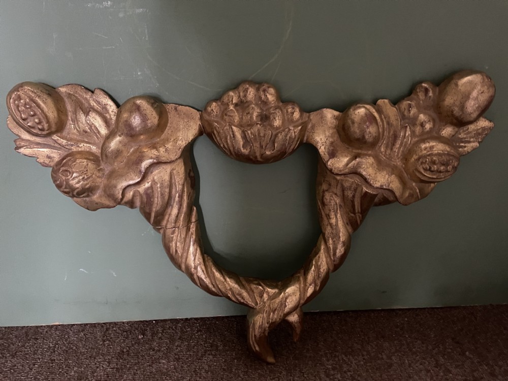 Mid C19th Italian carved giltwood wall appliqué .