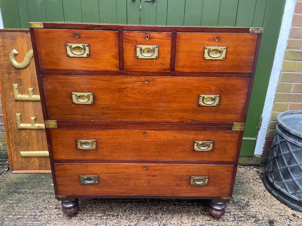 Mid C19th brass-bound mahogany military officer’s campaign chest of drawers . View II