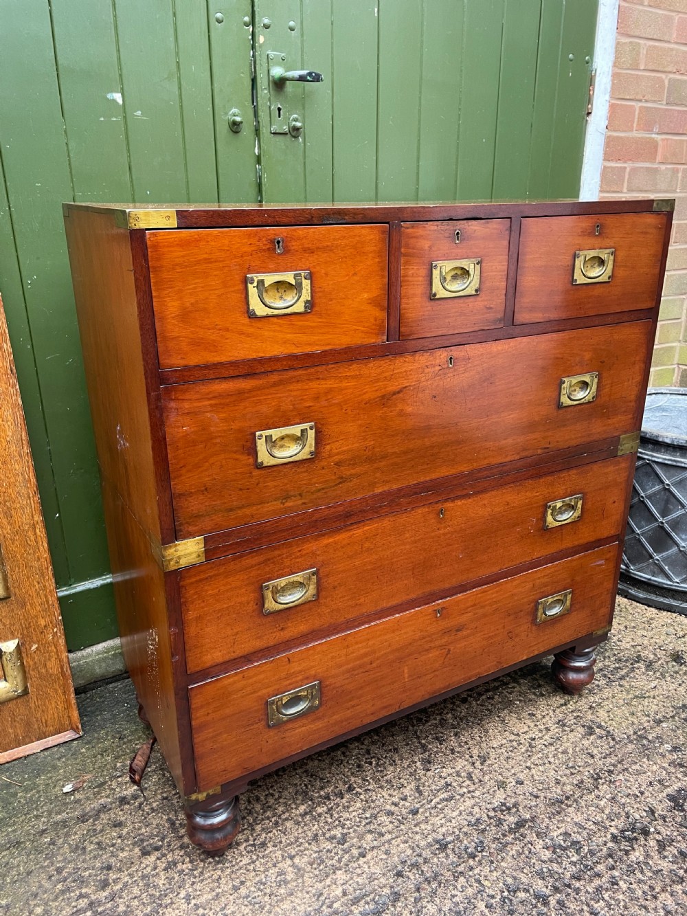 Mid C19th brass-bound mahogany military officer’s campaign chest of drawers . View VI