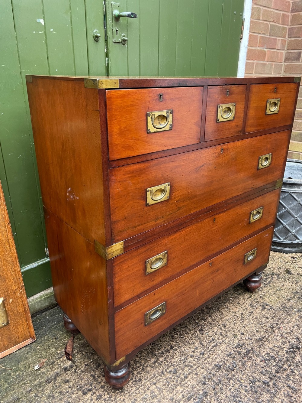 Mid C19th brass-bound mahogany military officer’s campaign chest of drawers . View XV