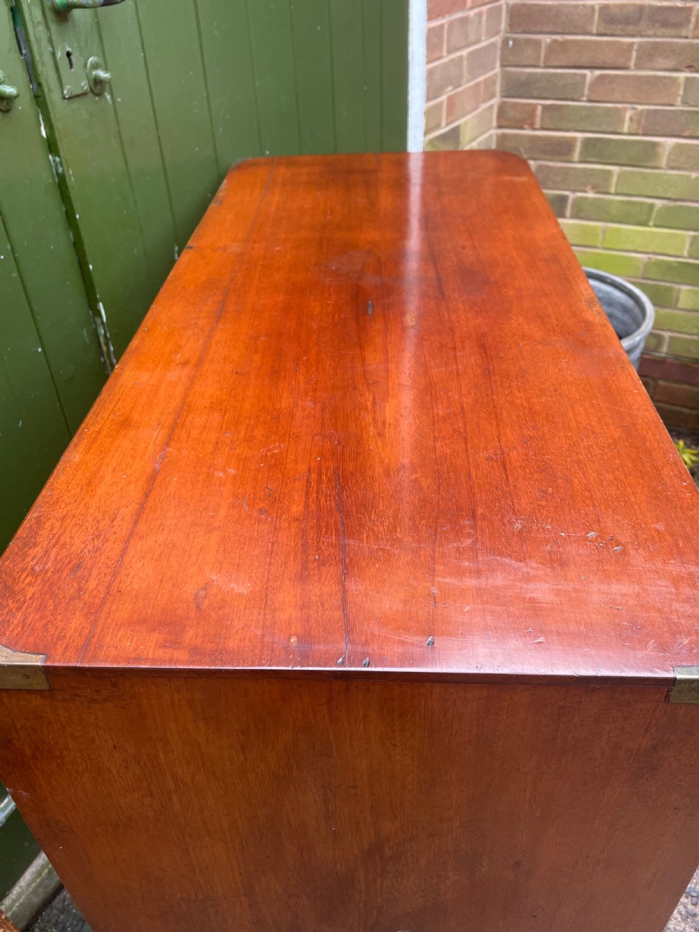 Mid C19th brass-bound mahogany military officer’s campaign chest of drawers . View XVIII